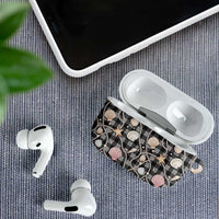 Hawaiian Ocean Seashells AirPods Case Black Palaka Pattern