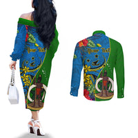 personalised-vanuatu-malampa-day-couples-matching-off-the-shoulder-long-sleeve-dress-and-long-sleeve-button-shirts-coat-of-arms-mix-tropical-flowers