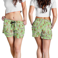 Green Palaka Hawaii Mele Kalikimaka Shorts for Women Ohia Lehua Shell Leis Funny Gingerbread Santa - Polynesian Pride
