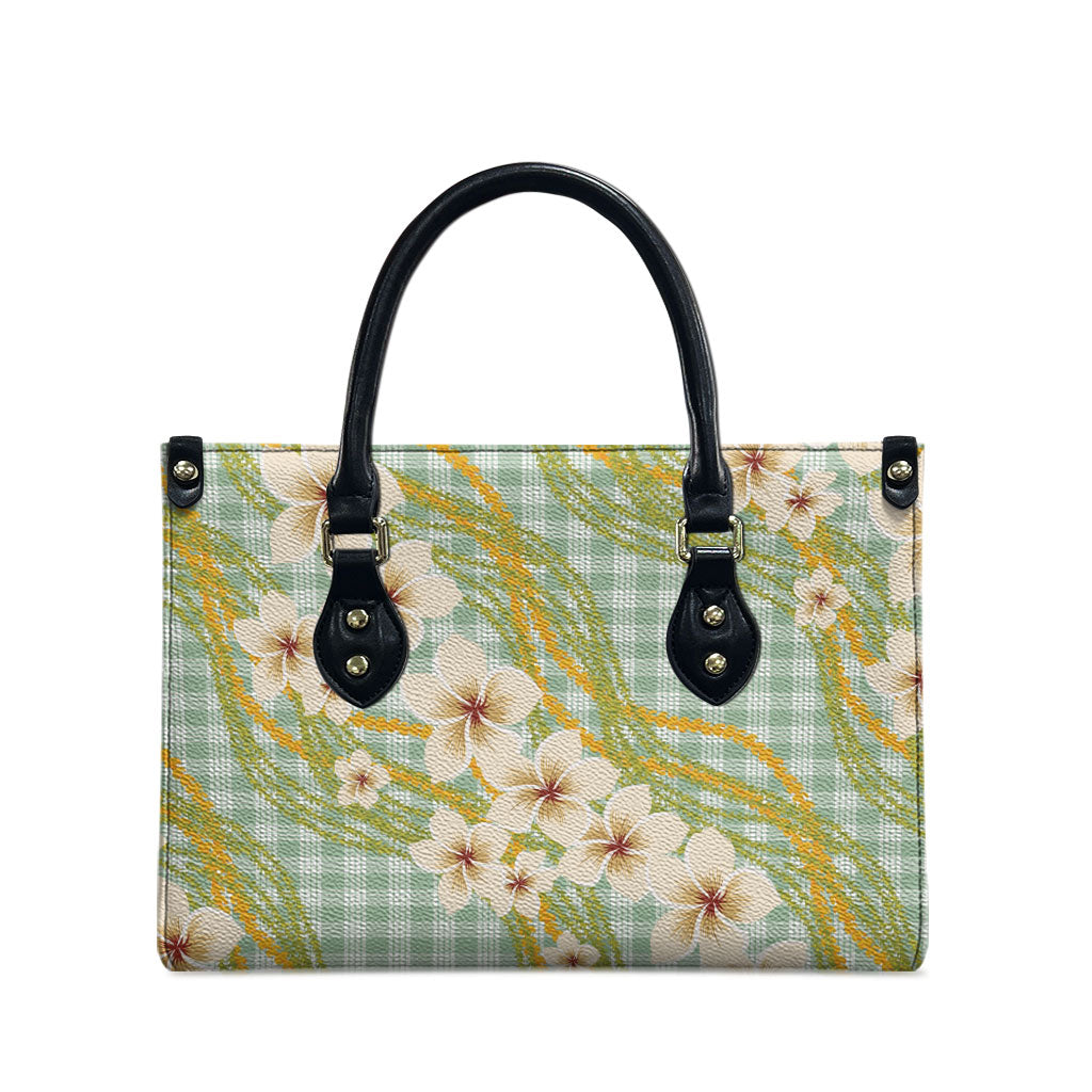 Liko Kukui Hawai'i Palaka Plumeria Leather Bag Puakenikeni and Maile Lei