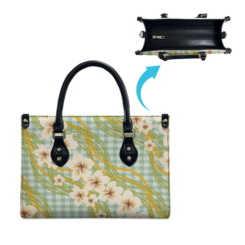 Liko Kukui Hawai'i Palaka Plumeria Leather Bag Puakenikeni and Maile Lei