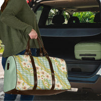 Liko Kukui Hawai'i Palaka Plumeria Travel Bag Puakenikeni and Maile Lei