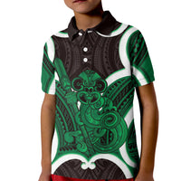 Kakariki Aotearoa Atua Tumatauenga Personalised Kid Polo Shirt Maori God Of War Tiki With Taiaha LT14 Kid Green - Polynesian Pride